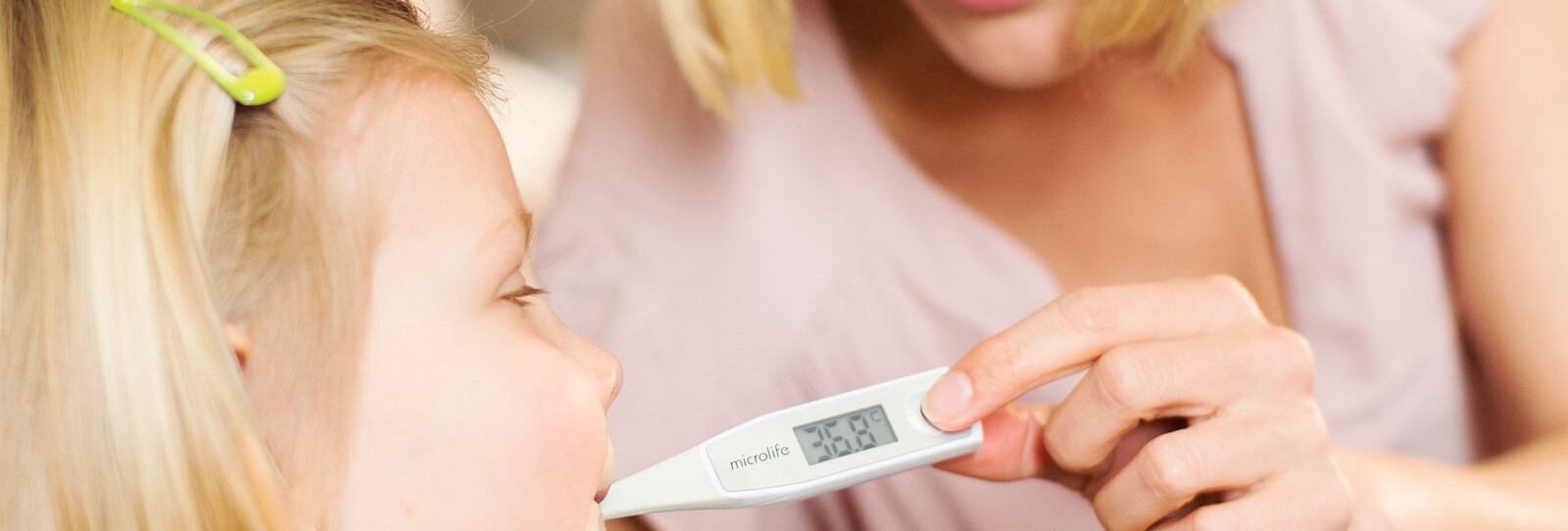 microlife-fever-measurement-girl